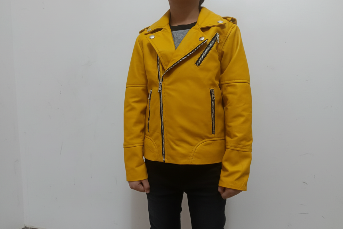 Yellow leather jacket worn by a person on a plain background