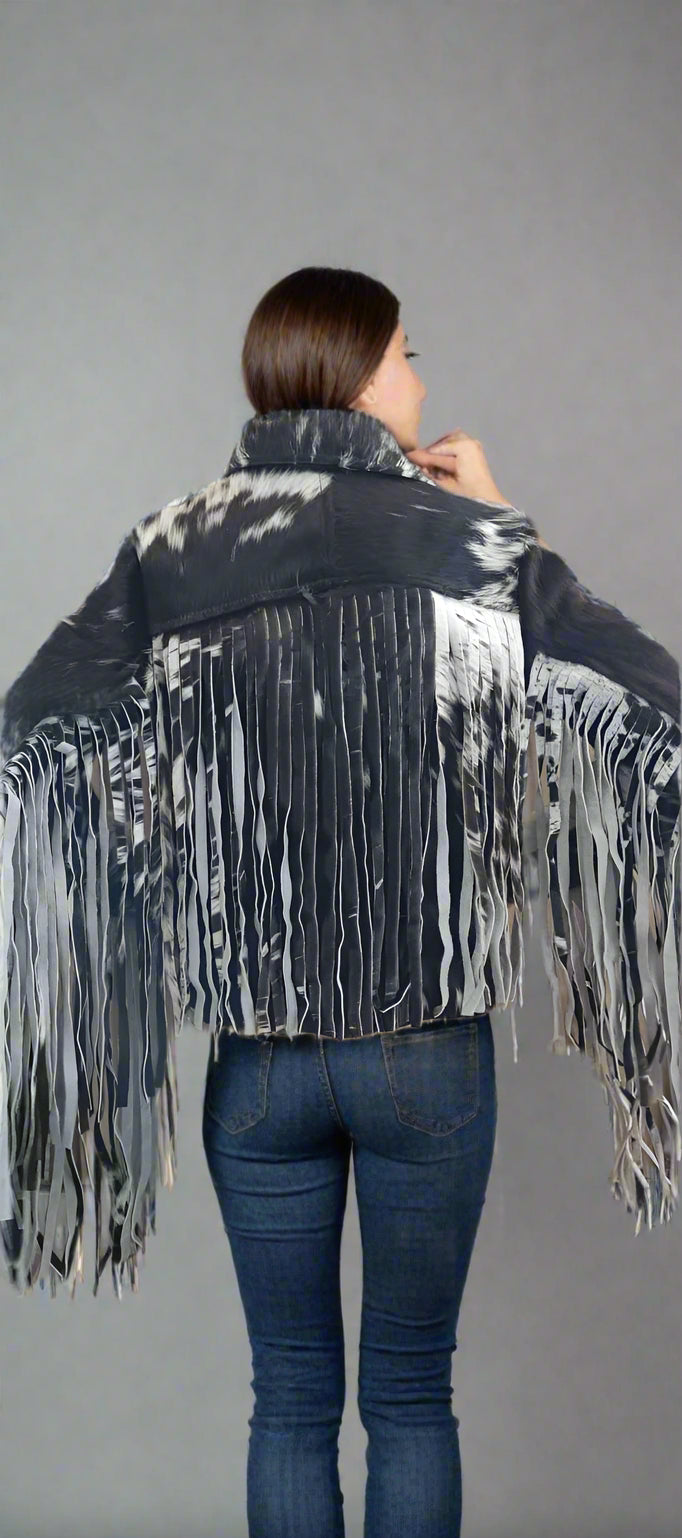 women wearing cow prin jacket with long fringes on sleeves  cow print jacket wintert leatehr jacket women