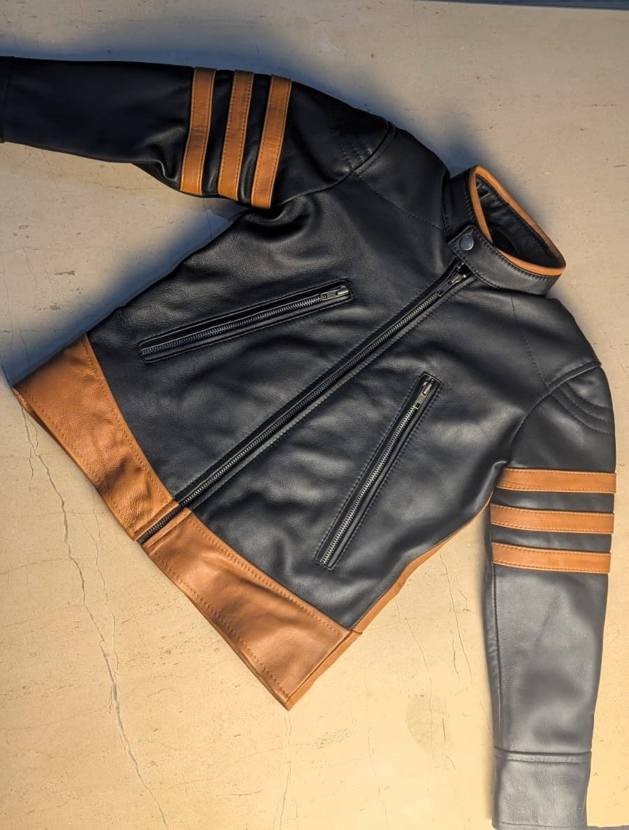 kid's back leather xman jacket laid on the a light marble floor